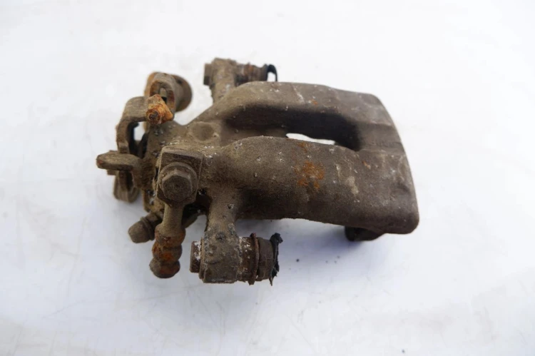 ZACISK HAMULCOWY LEWY TYŁ OPEL ASTRA II 1.6 16V