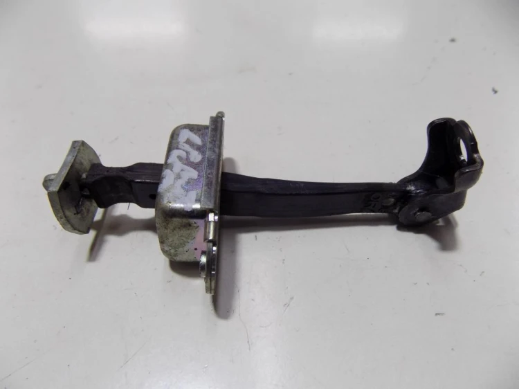 OGRANICZNIK DRZWI LEWY PRZÓD NISSAN NOTE I LIFT (2008-2013)