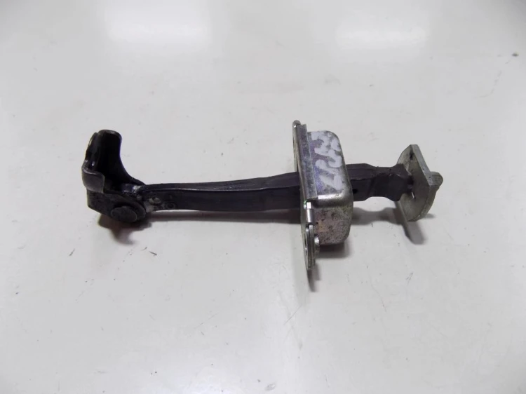 OGRANICZNIK DRZWI LEWY PRZÓD NISSAN NOTE I LIFT (2008-2013)