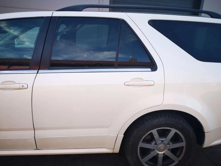 DRZWI LEWY TYŁ CADILLAC SRX 4.6 BENZ