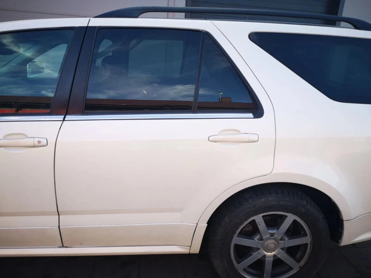 DRZWI LEWY TYŁ CADILLAC SRX 4.6 BENZ