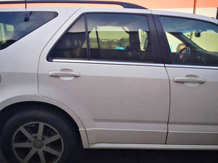DRZWI PRAWY TYŁ CADILLAC SRX 4.6 BENZ