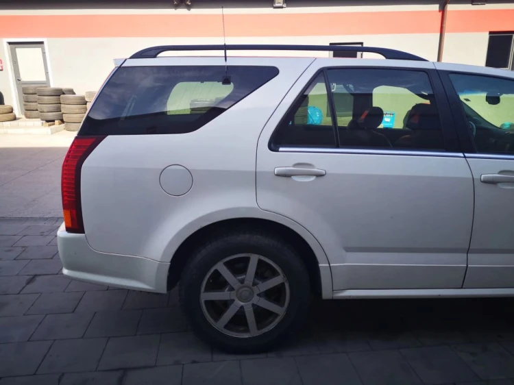 DRZWI PRAWY TYŁ CADILLAC SRX 4.6 BENZ